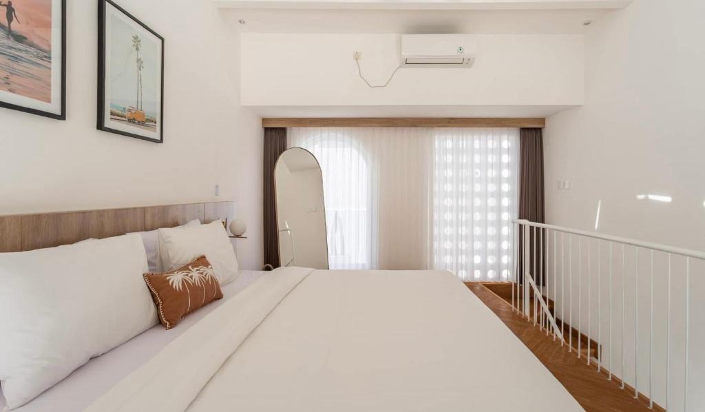 Ένα ή περισσότερα κρεβάτια σε δωμάτιο στο Villa Azura