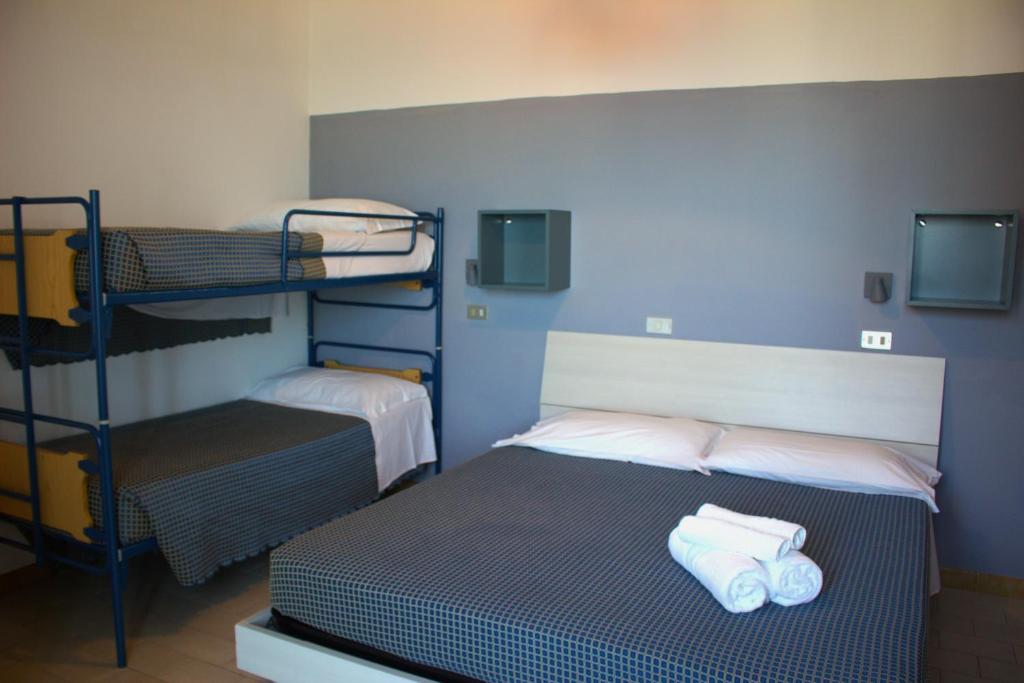 Postel nebo postele na pokoji v ubytování Hotel Atlas