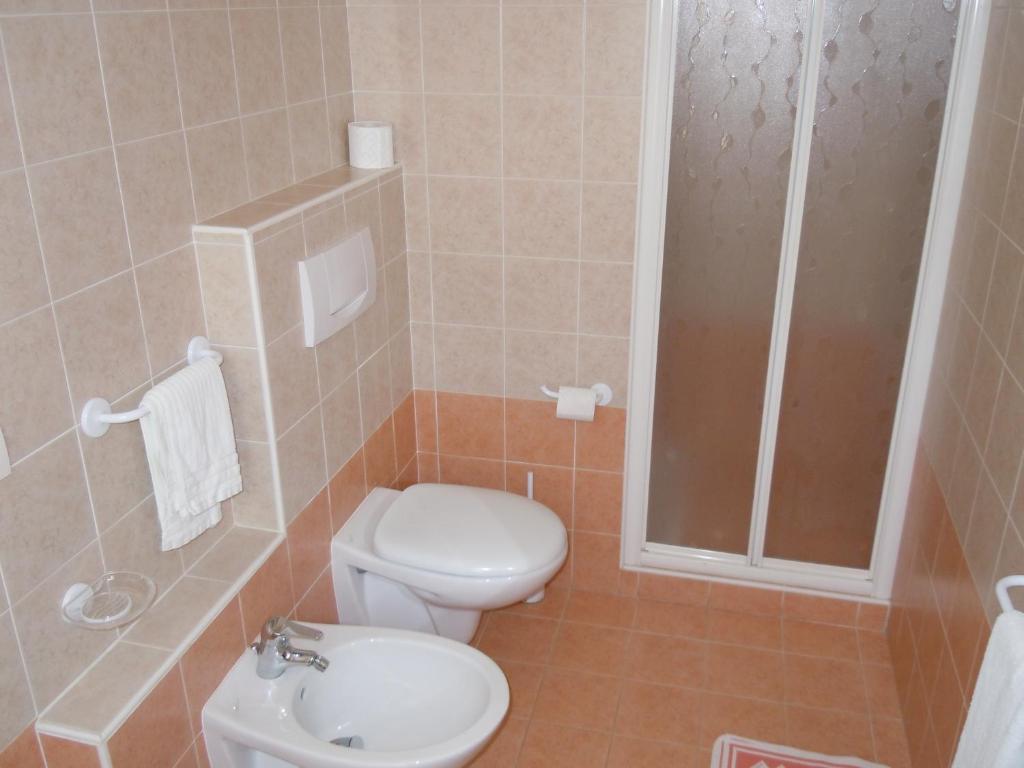 Koupelna v ubytování Albergo Elvira