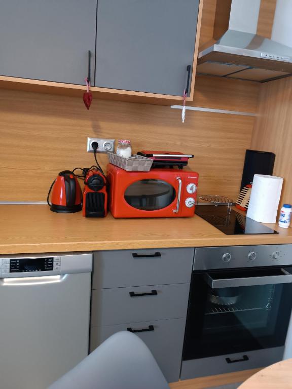 Kuchyň nebo kuchyňský kout v ubytování AEGEAN SUITES
