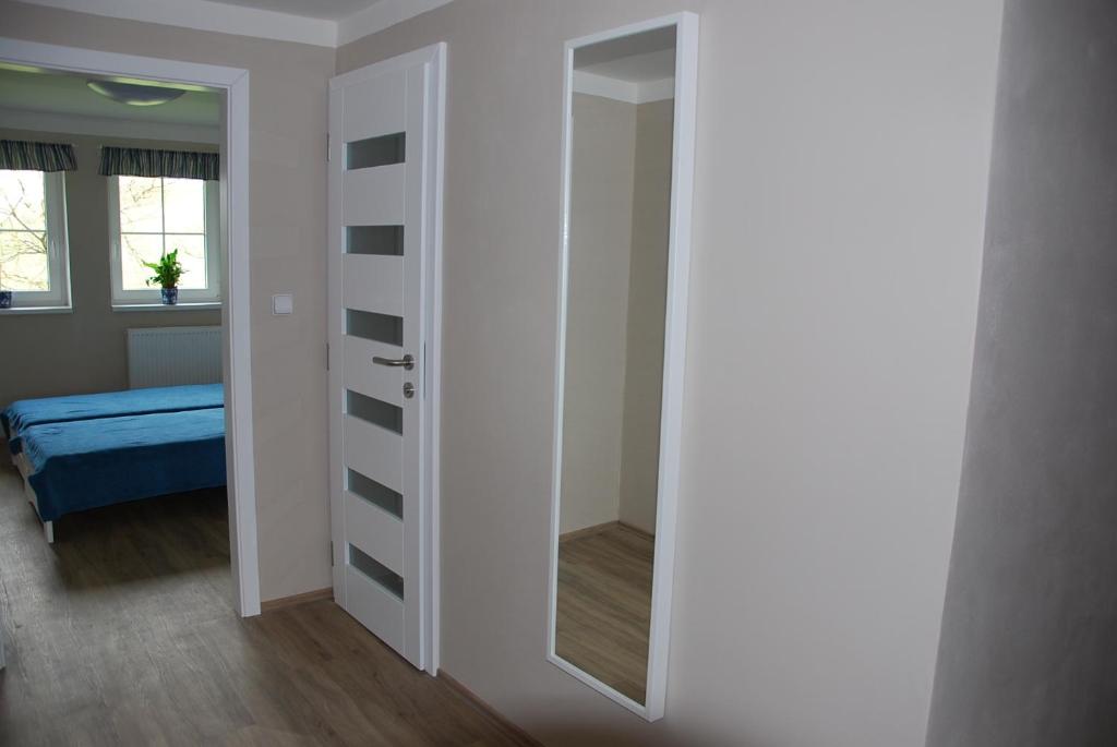 Postel nebo postele na pokoji v ubytování Apartment Ptačí Dům