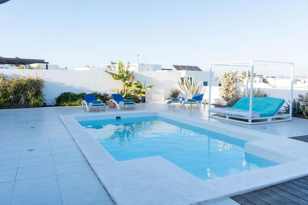The swimming pool at or close to Villa Perla Blanca