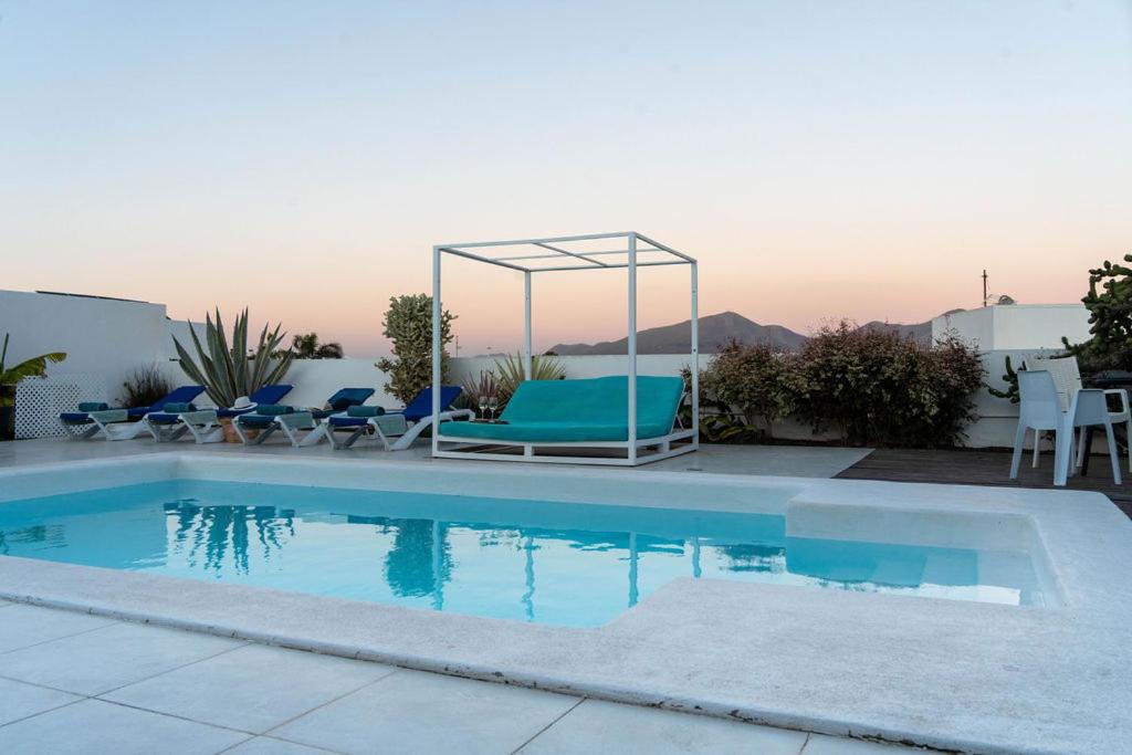 The swimming pool at or close to Villa Perla Blanca
