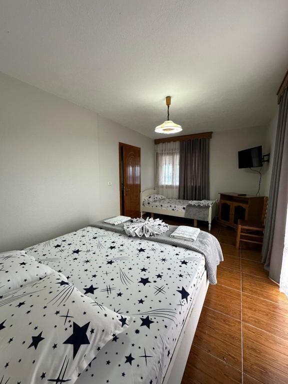 Postel nebo postele na pokoji v ubytování Camping & Guest House Herges