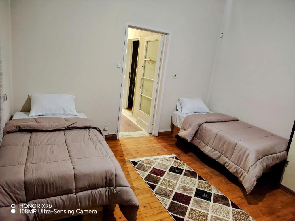 Letto o letti in una camera di Castle Hotel