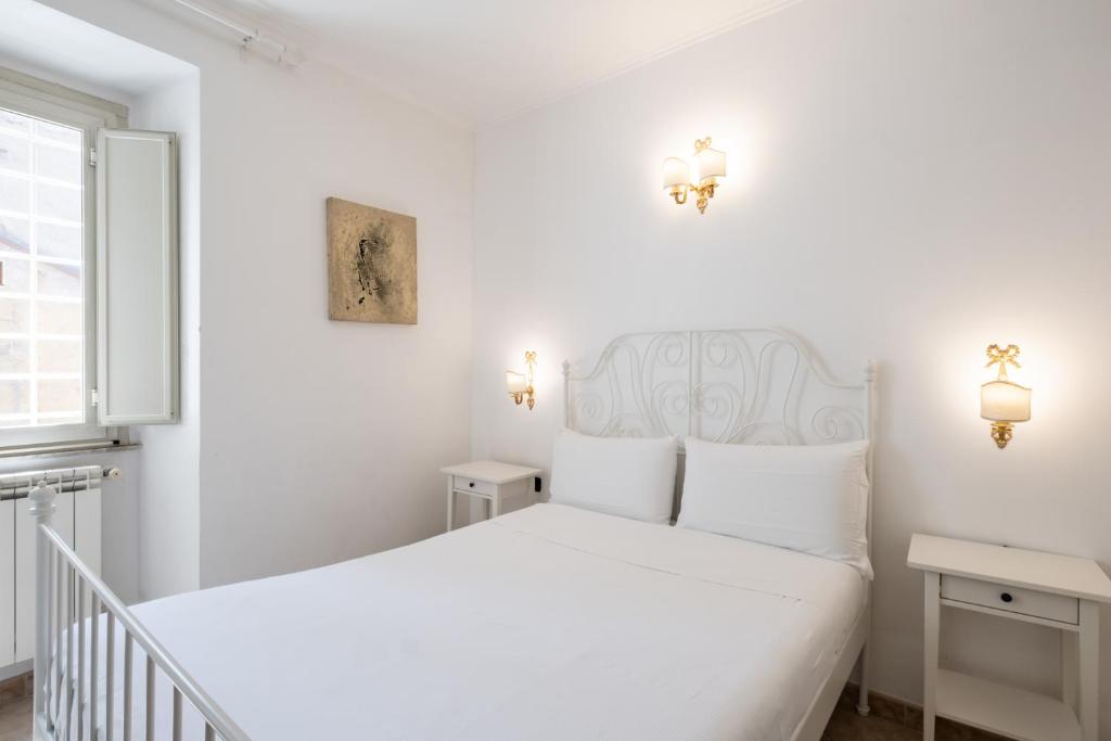 Posteľ alebo postele v izbe v ubytovaní 19 Steps Trevi