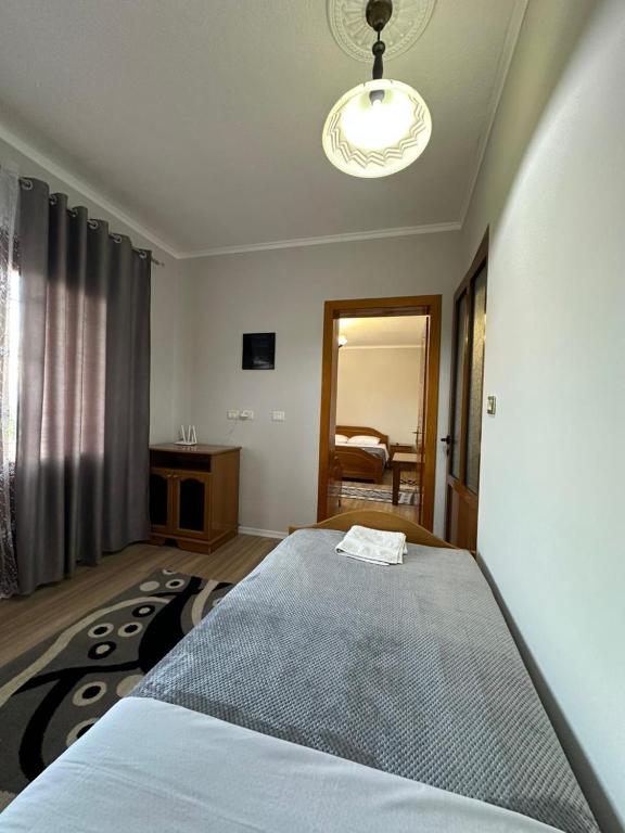Postel nebo postele na pokoji v ubytování Camping & Guest House Herges