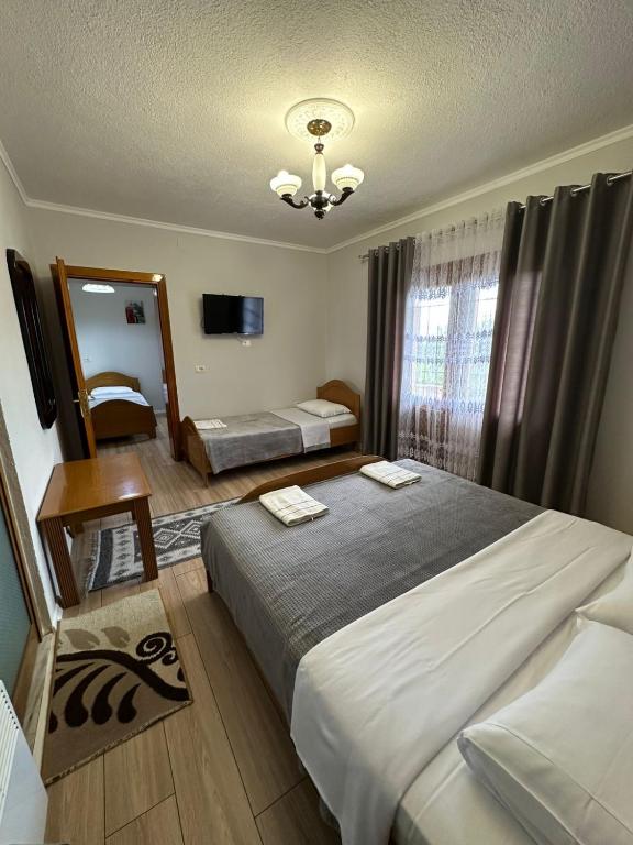 Postel nebo postele na pokoji v ubytování Camping & Guest House Herges