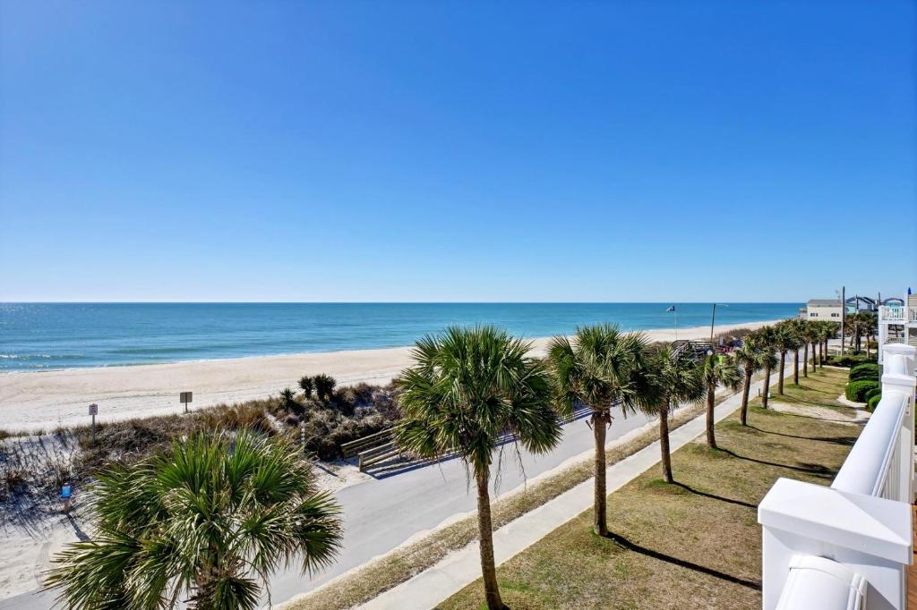 a view of the beach from the balcony of a condo at Sea Star Village 322 in West Onslow Beach