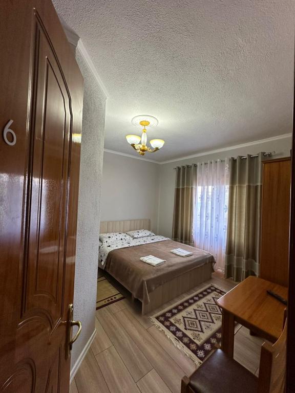 Postel nebo postele na pokoji v ubytování Camping & Guest House Herges