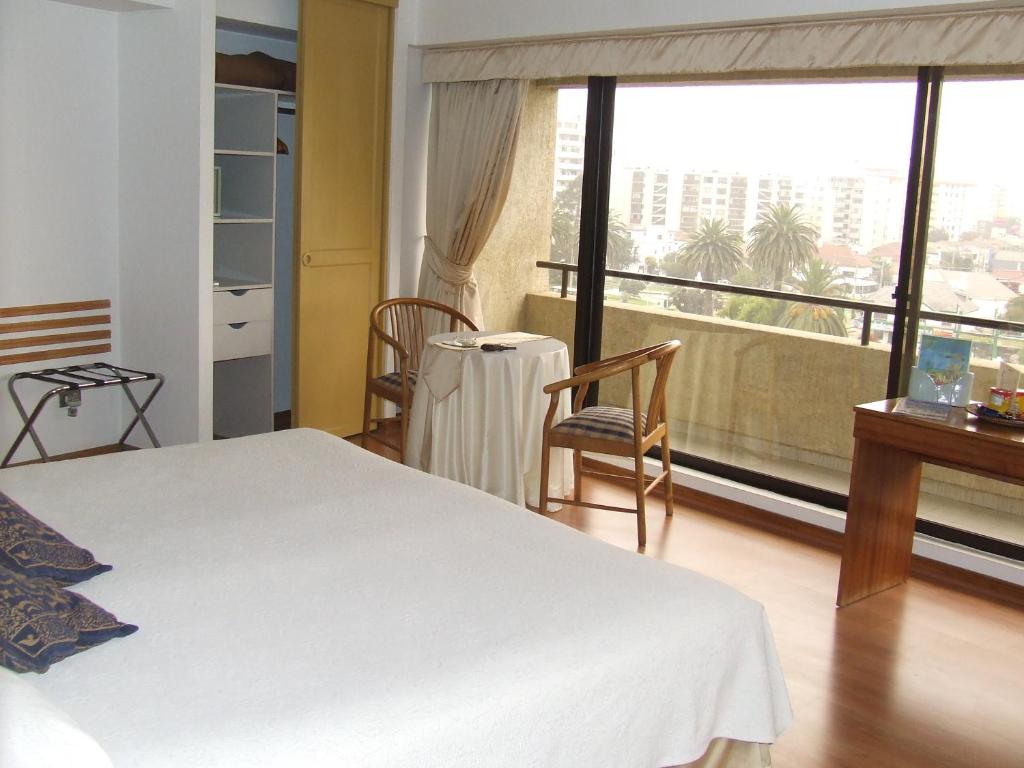 Postel nebo postele na pokoji v ubytování Gala Hotel