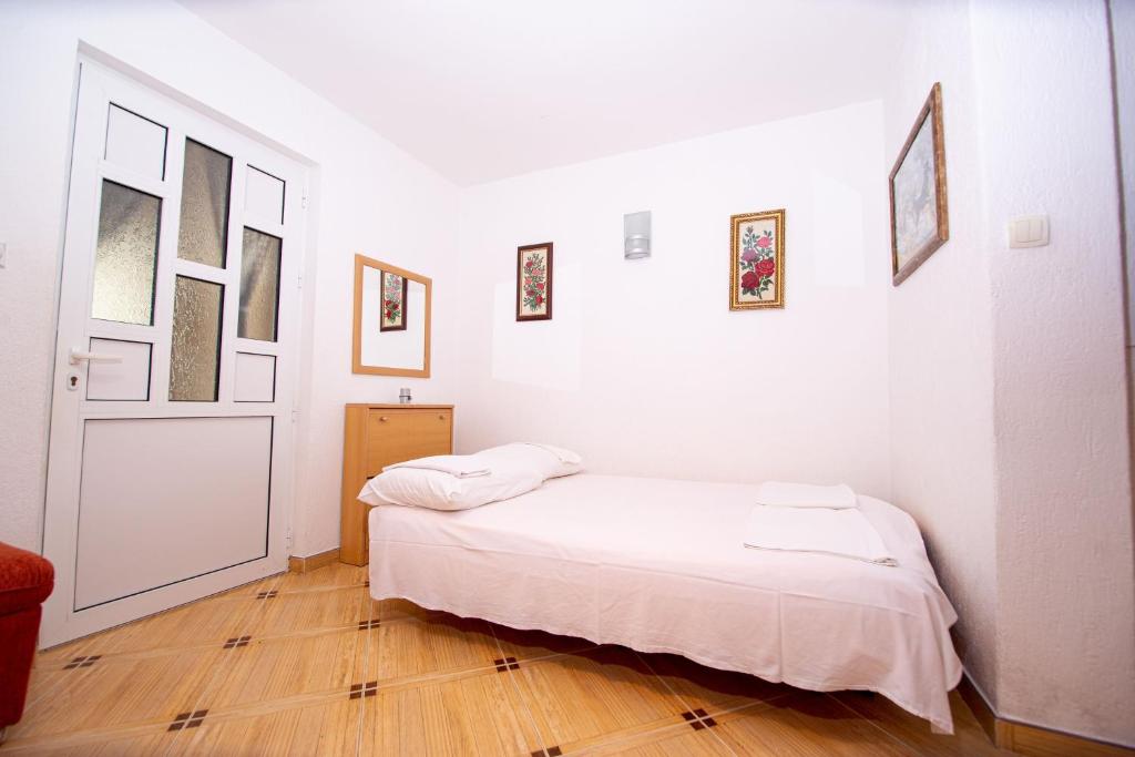Krevet ili kreveti u jedinici u okviru objekta Jadran Apartments