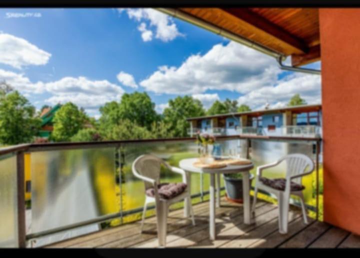 Balkón nebo terasa v ubytování Apartmán v arealu Doky Lipno