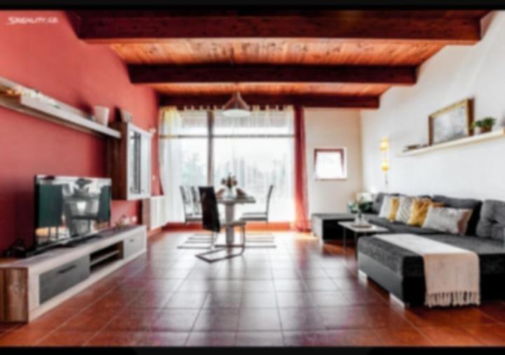 Posezení v ubytování Apartmán v arealu Doky Lipno