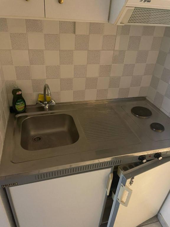 Kuchyň nebo kuchyňský kout v ubytování Tasos Manaritsas Rooms