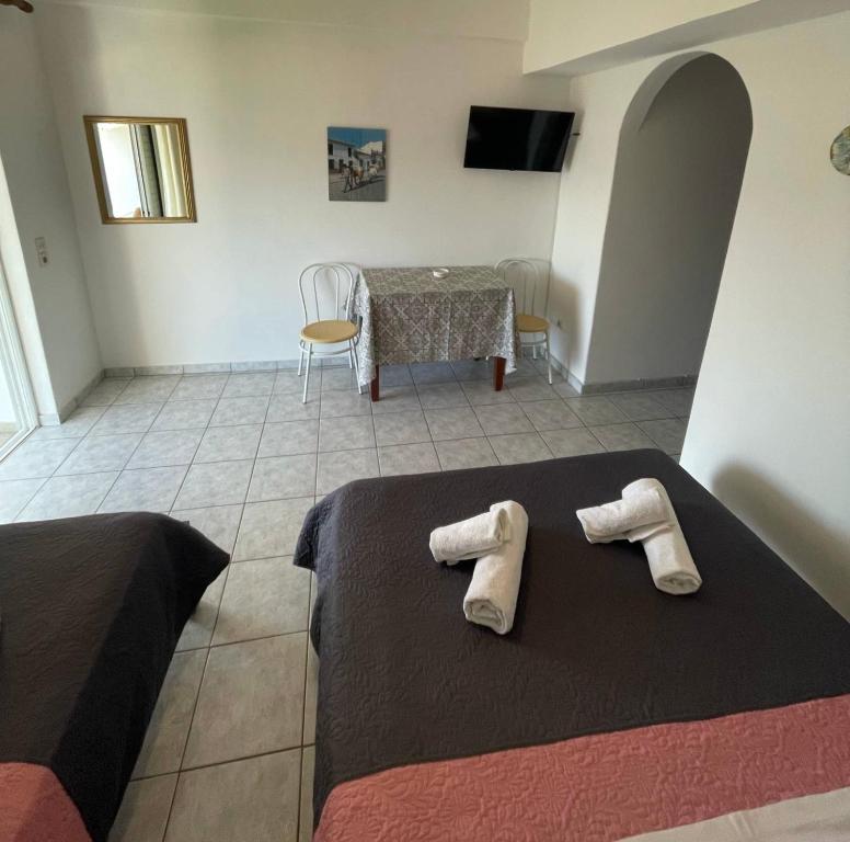 Postel nebo postele na pokoji v ubytování Tasos Manaritsas Rooms