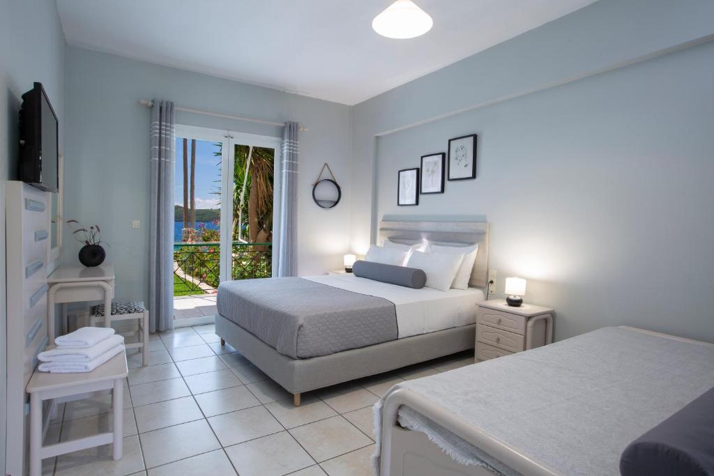 Posteľ alebo postele v izbe v ubytovaní Captain Nick Aparthotel