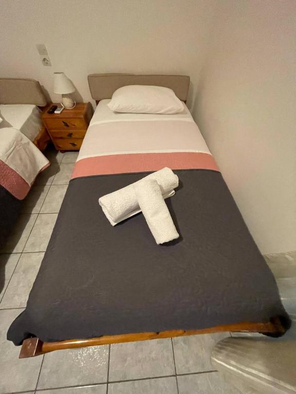 Postel nebo postele na pokoji v ubytování Tasos Manaritsas Rooms