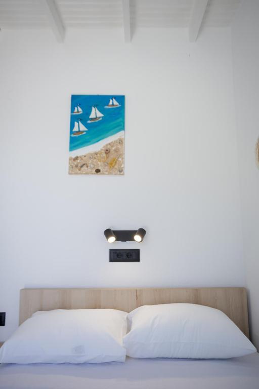 Postel nebo postele na pokoji v ubytování Finikas Resort Sfakia - Seaside Rooms