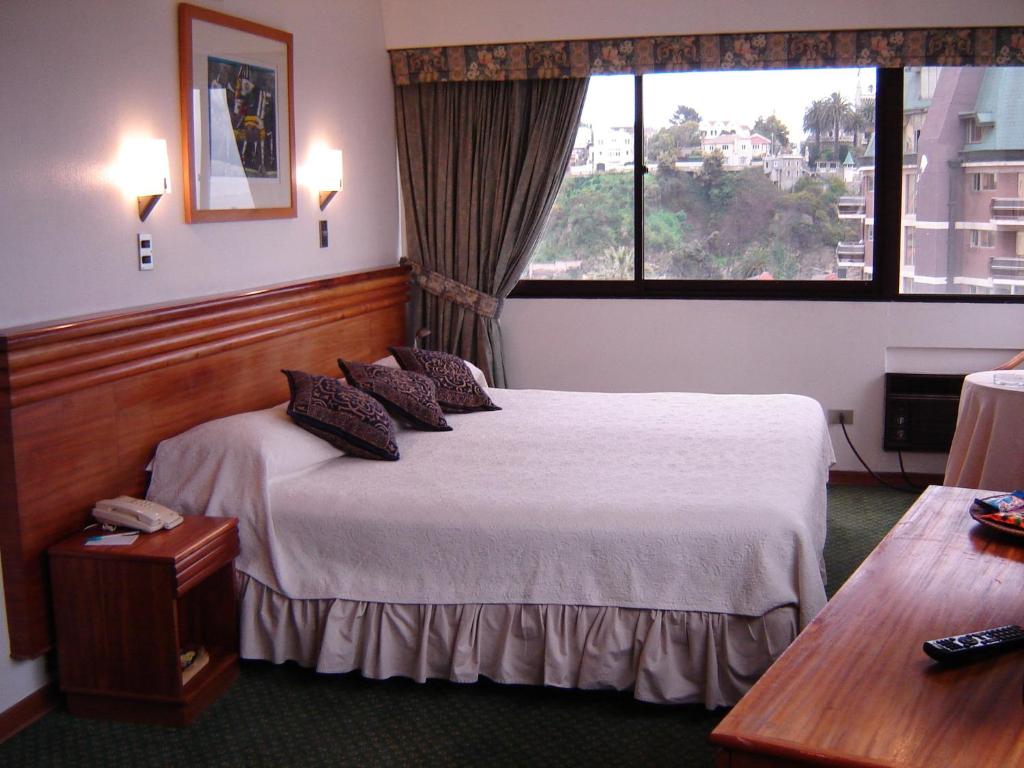 Postel nebo postele na pokoji v ubytování Gala Hotel