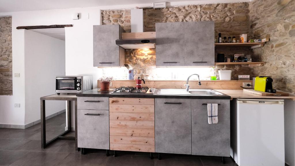 Kuchyň nebo kuchyňský kout v ubytování B&B Appartamento - IL RIONE