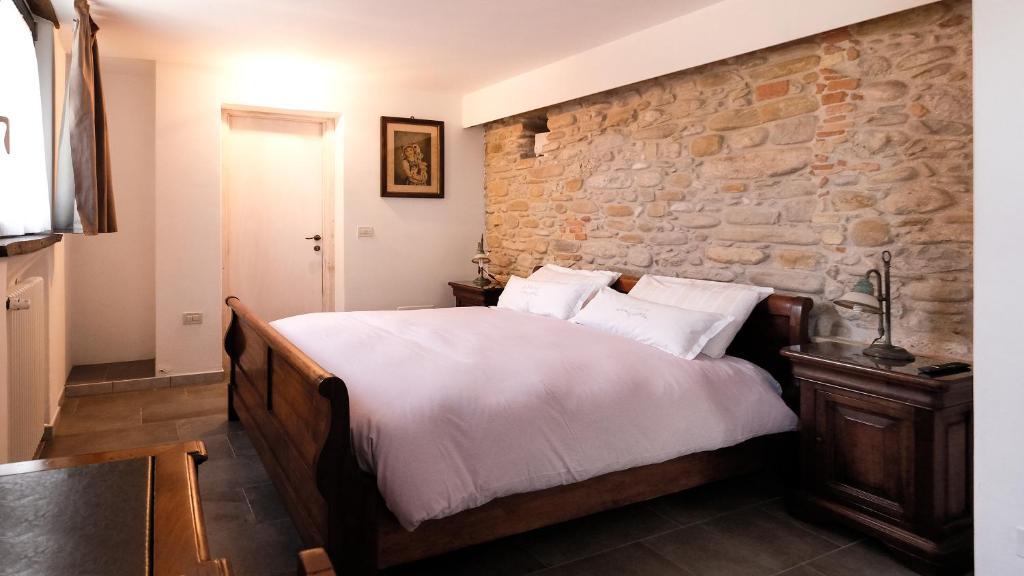 Postel nebo postele na pokoji v ubytování B&B Appartamento - IL RIONE