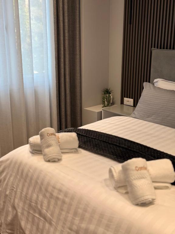 Postel nebo postele na pokoji v ubytování Comfort Inn Hotel