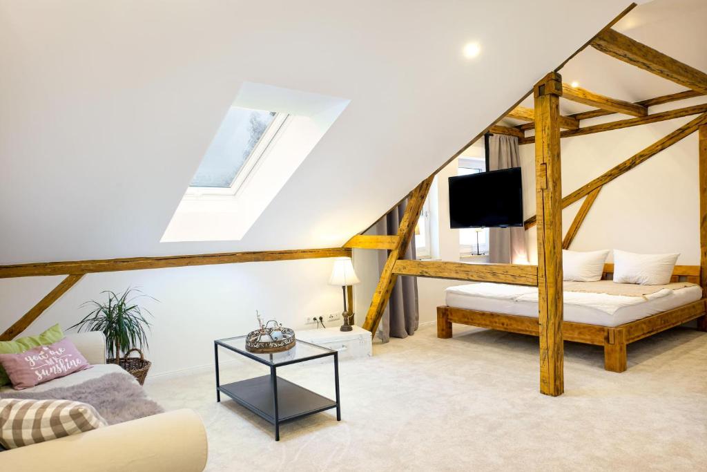 Giường trong phòng chung tại Ferienwohnung Oberdeck Eckernförde