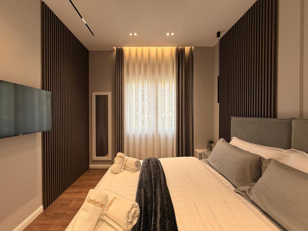 Postel nebo postele na pokoji v ubytování Comfort Inn Hotel