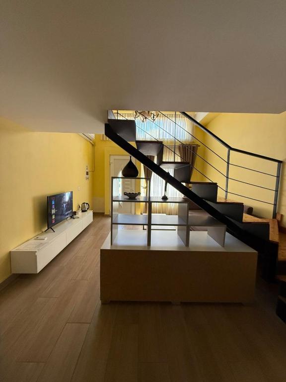 TV a/nebo společenská místnost v ubytování Auto Tana Guest House