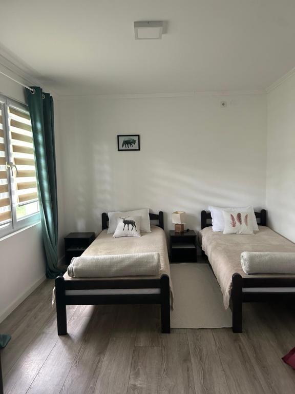 Posteľ alebo postele v izbe v ubytovaní Apartments Čelopek