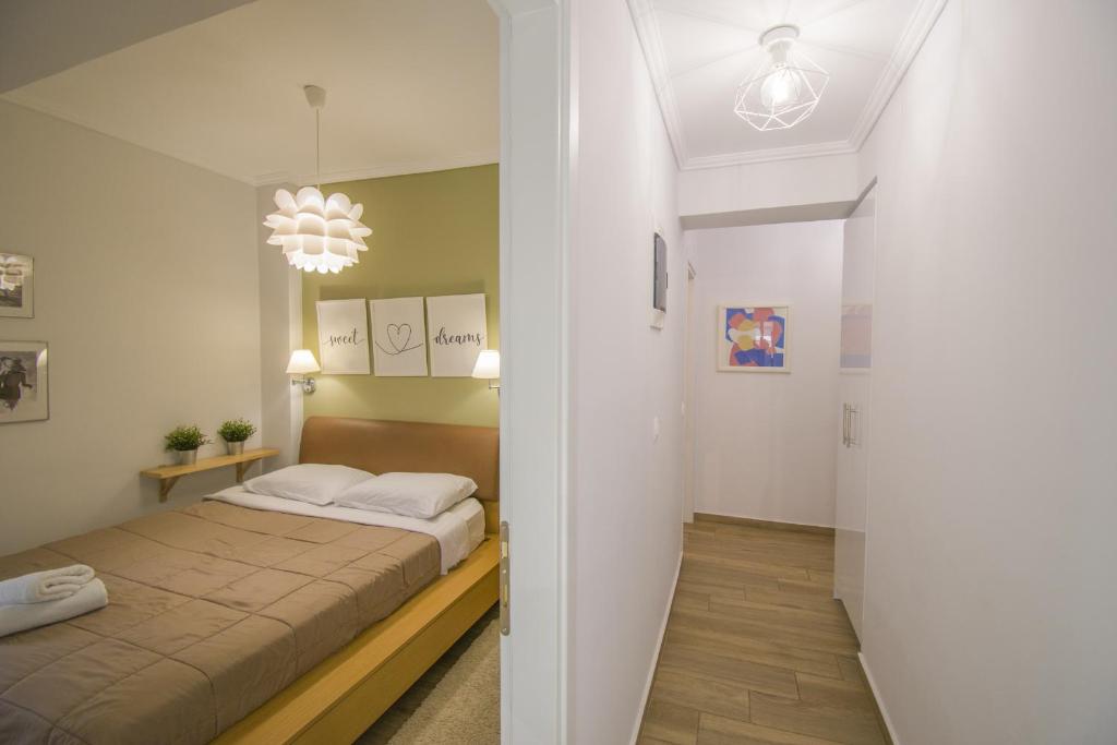 Postel nebo postele na pokoji v ubytování Bianca Suites