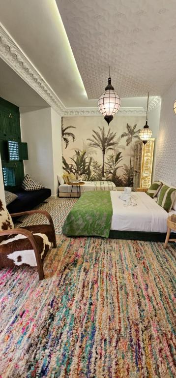 Postel nebo postele na pokoji v ubytování Riad JiL & SPA