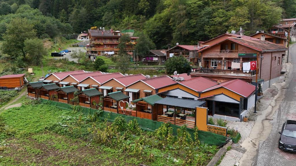 an overhead view of a group of houses in a village at Çakıroğlu Villa Kent in Uzungol