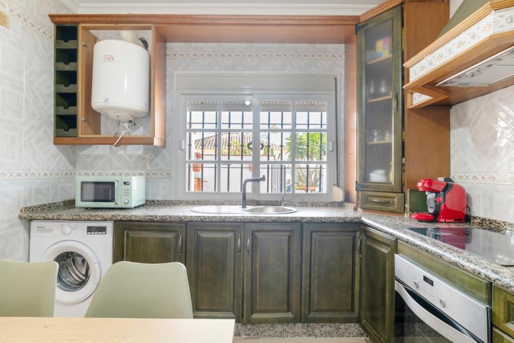 Kuchyň nebo kuchyňský kout v ubytování Apartamento Mayo 1