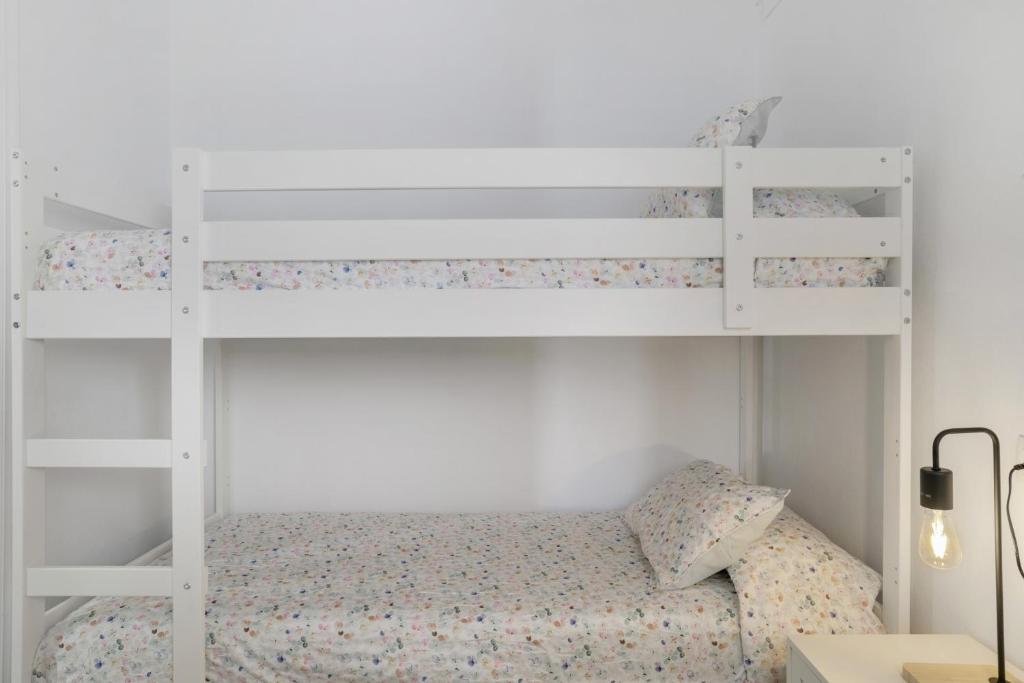 Postel nebo postele na pokoji v ubytování Apartamento Mayo 1
