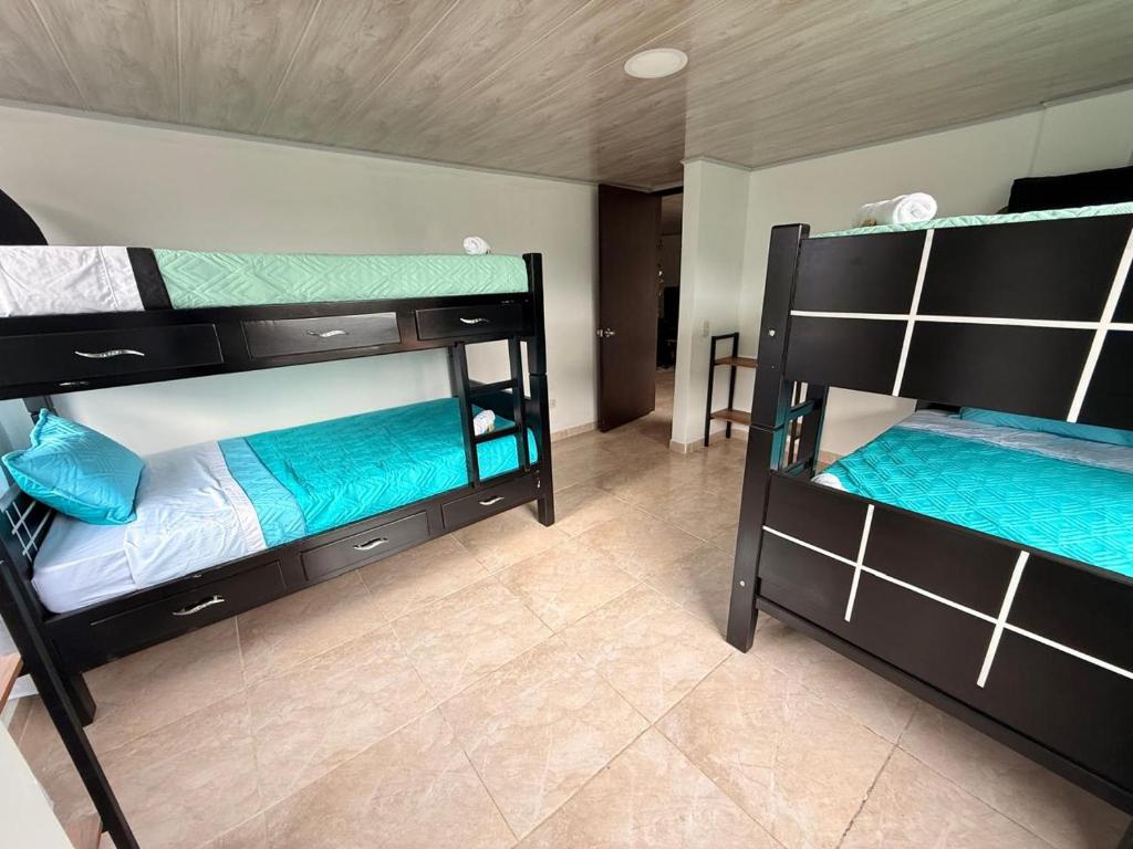 Postel nebo postele na pokoji v ubytování Pandora Hostel
