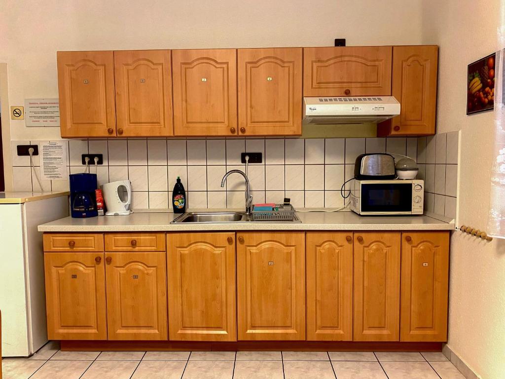 Kuchyňa alebo kuchynka v ubytovaní Guszti Villa Hévíz