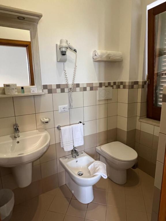 Koupelna v ubytování Hotel Oriente