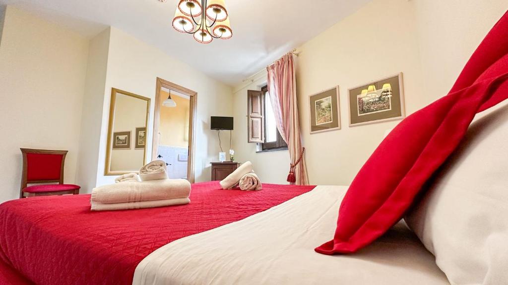 Postel nebo postele na pokoji v ubytování Suite Casa Santicelli Maratea