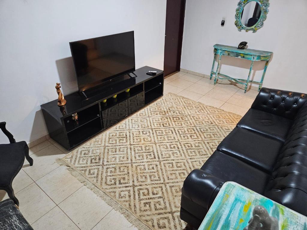 TV a/nebo společenská místnost v ubytování Encarna Hostel