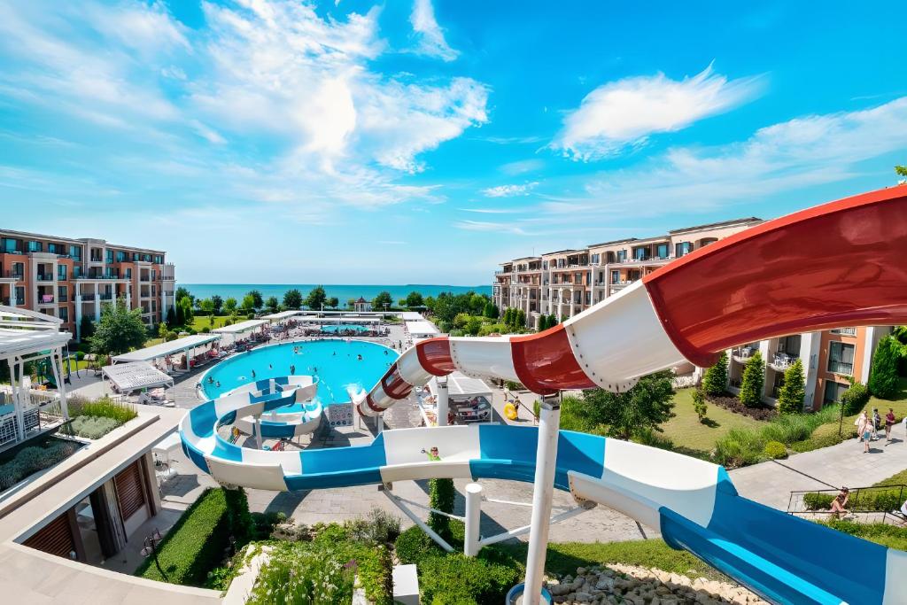 a view of a water park at a resort at Premier Fort Beach Apartment with Pool & Sea View in Sveti Vlas