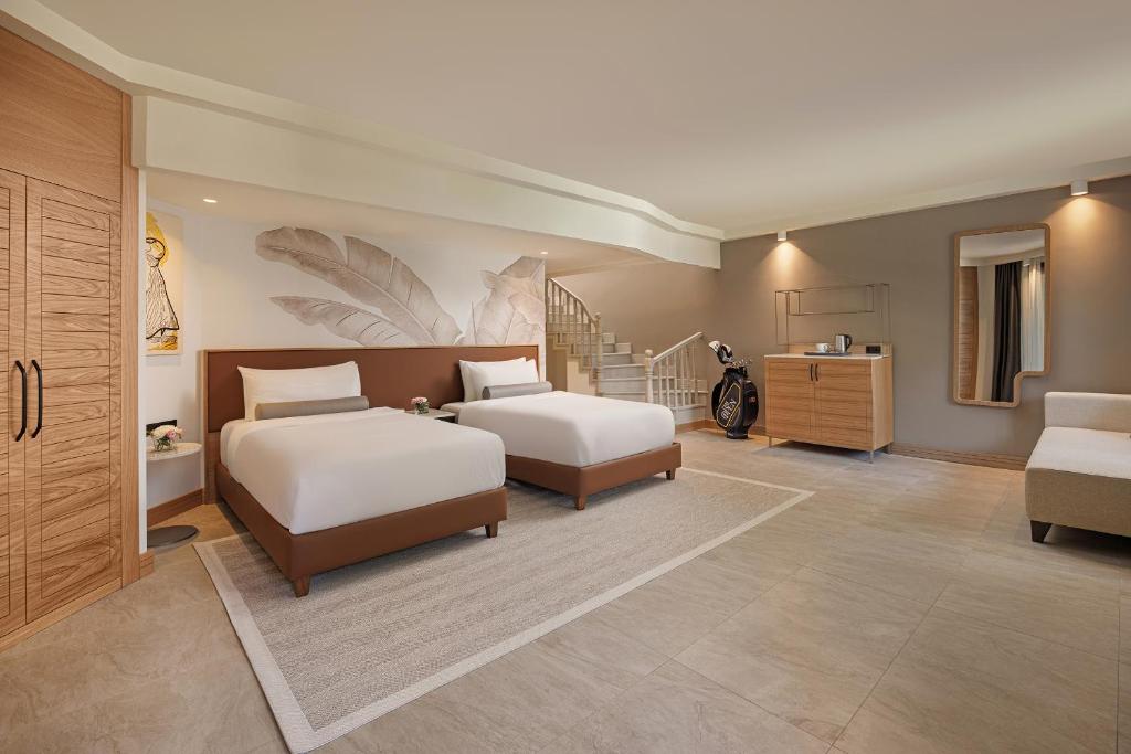 Postel nebo postele na pokoji v ubytování Sirene Belek Hotel