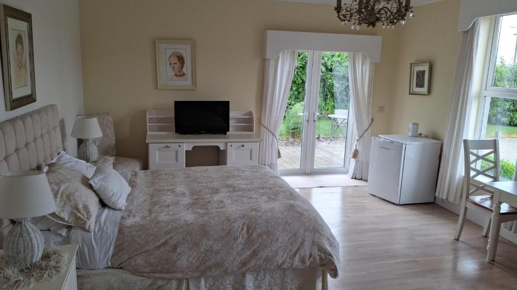 Postel nebo postele na pokoji v ubytování Deeside Manor
