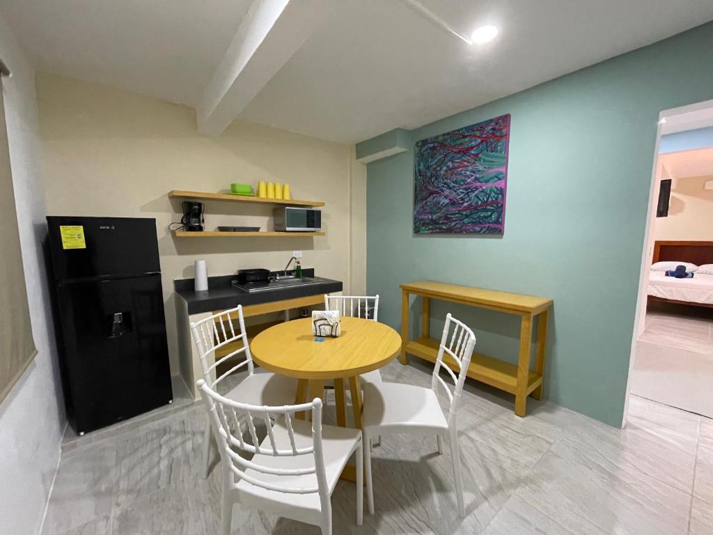 Kuchyň nebo kuchyňský kout v ubytování Casona Suites
