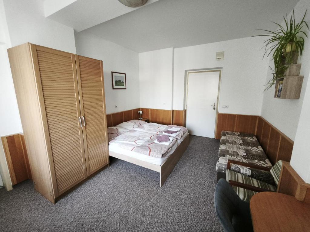 Postel nebo postele na pokoji v ubytování Pension Pod Šibeňákem