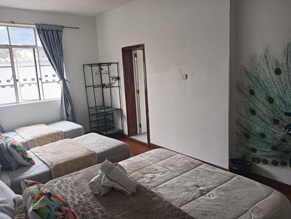 Postel nebo postele na pokoji v ubytování Casa Samor La Candelaria