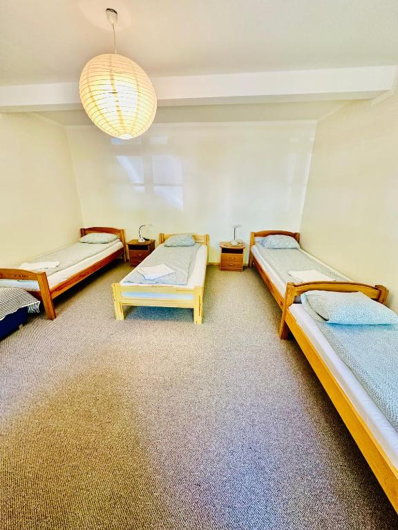 Postel nebo postele na pokoji v ubytování Express Guest House