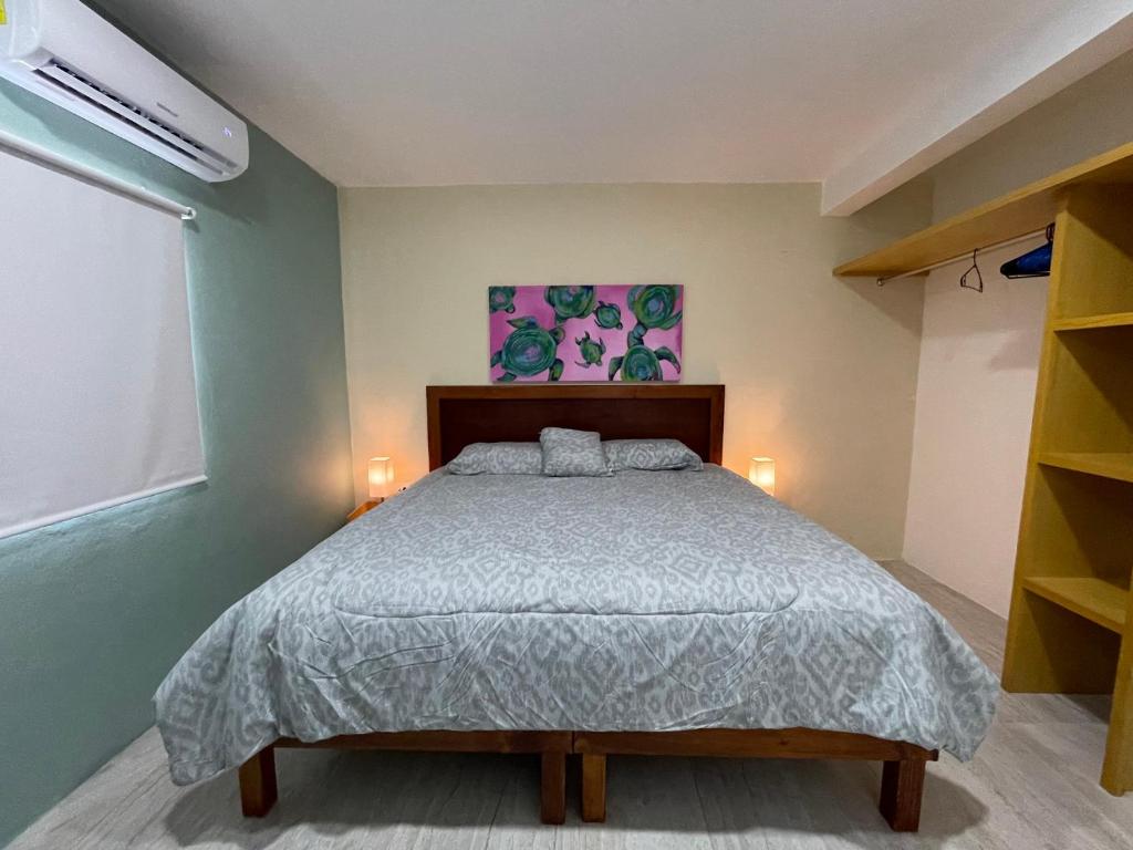 Postel nebo postele na pokoji v ubytování Casona Suites