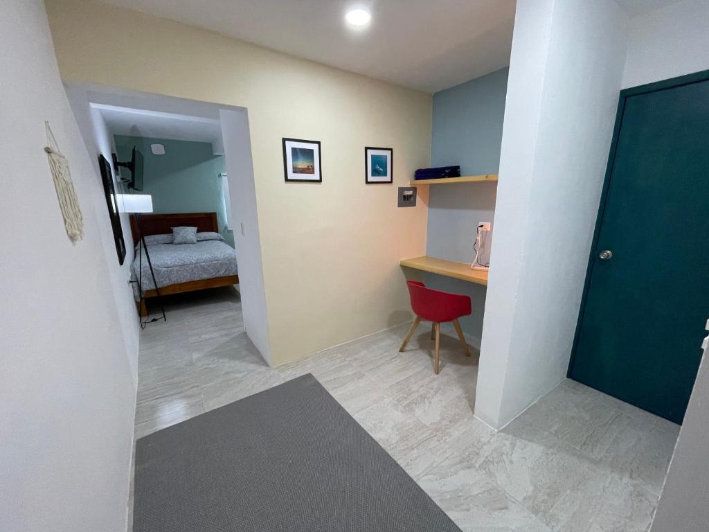 Postel nebo postele na pokoji v ubytování Casona Suites